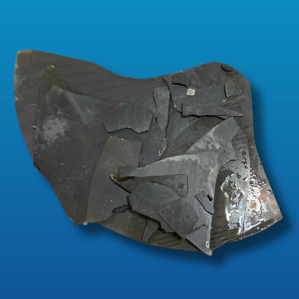 Piece Of Damaged Metal Material From A Tool Or Machine